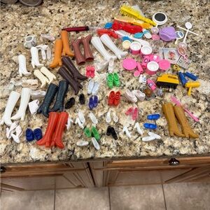 Vintage Barbie shoes and some accessories